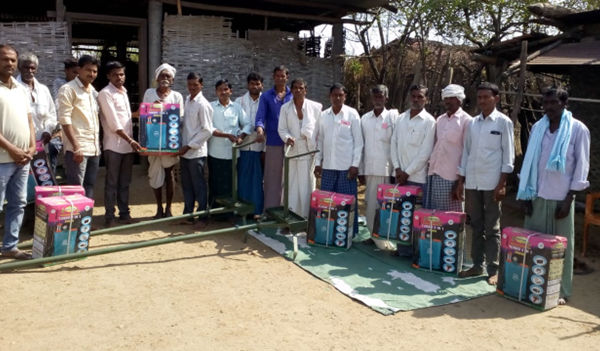 Giving Spray pumps and weeder to farmers under “Raithusena FPC” - Adilabad
